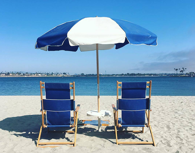 Beach chairs and umbrella overlooking Mission Bay