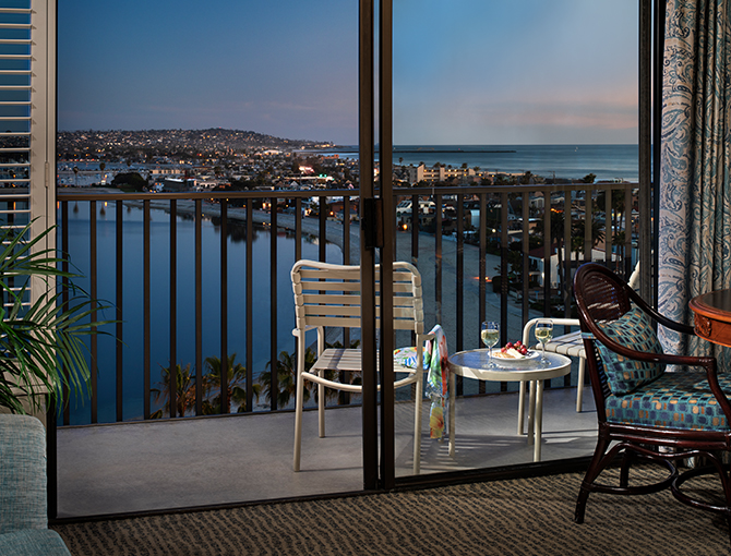 Views of Mission Bay and Pacific Ocean at dusk from the Bay View Suite at the Catamaran Resort Hotel and Spa